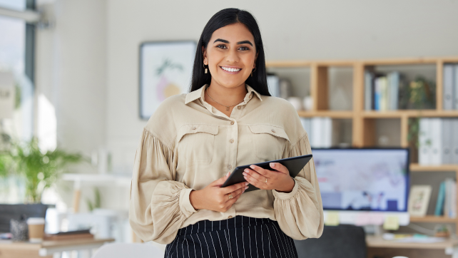 Female marketing manager holding a clipboard